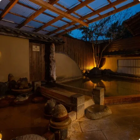 Outdoor hot spring bath at Ryokan Kiraku
