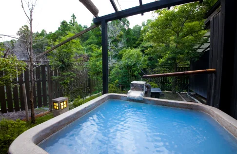 A detached room with its own open-air bath at Yufuin Yasuha