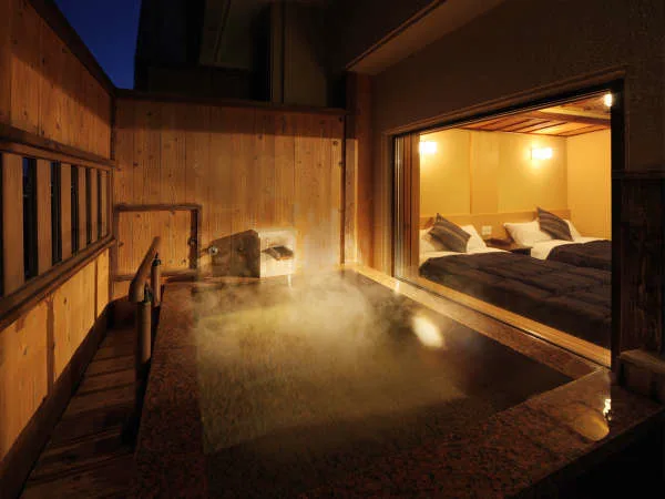 A guest room at Kounoyu with its own private open-air bath